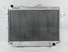 Load image into Gallery viewer, GPI Aluminum Radiator For 1998-2007 Toyota LandCruiser 100 Series HZJ105R HDJ100R MT 1999 2000 2001 2002 2003 2004 2005 2006