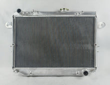 Load image into Gallery viewer, GPI Aluminum Radiator For 1998-2007 Toyota Landcruiser 100 Series HDJ100R HZJ105R FZJ105R AT 1999 2000 2001 2002 2003 2004 2005 2006