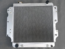 Load image into Gallery viewer, GPI 3 ROW Aluminum Racing Radiator & Shroud fan for 1987-2006 Jeep Wrangler YJ/TJ 2.4L-4.2L 1987 1988 1989 1990 1991 1992 1993 1994 1995 1996 1997 1998 1999 2000 2001 2002 2003 2004 2005 2006