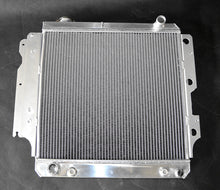 Load image into Gallery viewer, GPI 3 ROW Aluminum Racing Radiator & Shroud fan for 1987-2006 Jeep Wrangler YJ/TJ 2.4L-4.2L 1987 1988 1989 1990 1991 1992 1993 1994 1995 1996 1997 1998 1999 2000 2001 2002 2003 2004 2005 2006