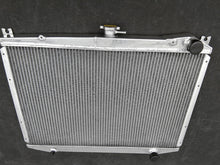 Load image into Gallery viewer, Aluminum Radiator & fan Fit 1986-1997 Nissan D21 Pathfinder Pickup E LE SE XE L4 V6 MT 1986 1987 1988 1989 1990 1991 1992 1993 1994 1995 1996 1997