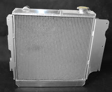 Load image into Gallery viewer, GPI 3 ROW Aluminum Racing Radiator & Shroud fan for 1987-2006 Jeep Wrangler YJ/TJ 2.4L-4.2L 1987 1988 1989 1990 1991 1992 1993 1994 1995 1996 1997 1998 1999 2000 2001 2002 2003 2004 2005 2006