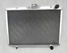 Load image into Gallery viewer, Aluminum Radiator & fan Fit 1986-1997 Nissan D21 Pathfinder Pickup E LE SE XE L4 V6 MT 1986 1987 1988 1989 1990 1991 1992 1993 1994 1995 1996 1997