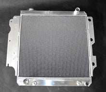 Load image into Gallery viewer, GPI 3 ROW  Aluminum Racing Radiator &amp; Shroud fan  for 1987-2006 Jeep Wrangler YJ/TJ 2.4L-4.2L 1987 1988 1989 1990 1991 1992 1993 1994 1995 1996 1997 1998 1999 2000 2001 2002 2003 2004 2005 2006
